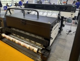 Auto feeding and take-up system